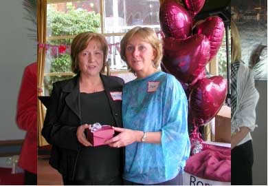 Arlene Sloan presenting Greater Vancouver RWA Volunteer of the Year award to Susan Lyons at Valentine’s Luncheon