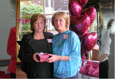 Arlene Sloan presenting Greater Vancouver RWA Volunteer of the Year award to Susan Lyons at Valentine�s Luncheon